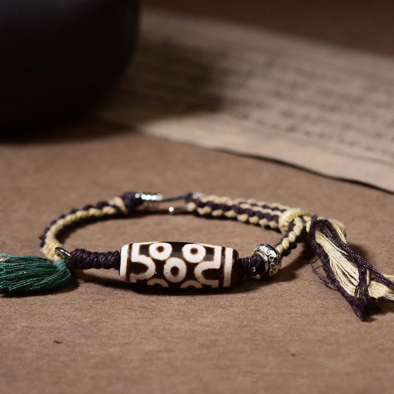 Neun-Augen-Dzi-Perlen-Schutz-Achat-Armband Unisex