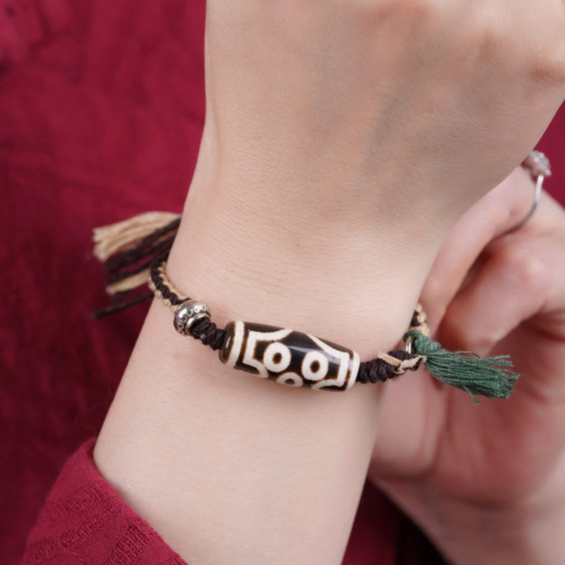 Neun-Augen-Dzi-Perlen-Schutz-Achat-Armband Unisex
