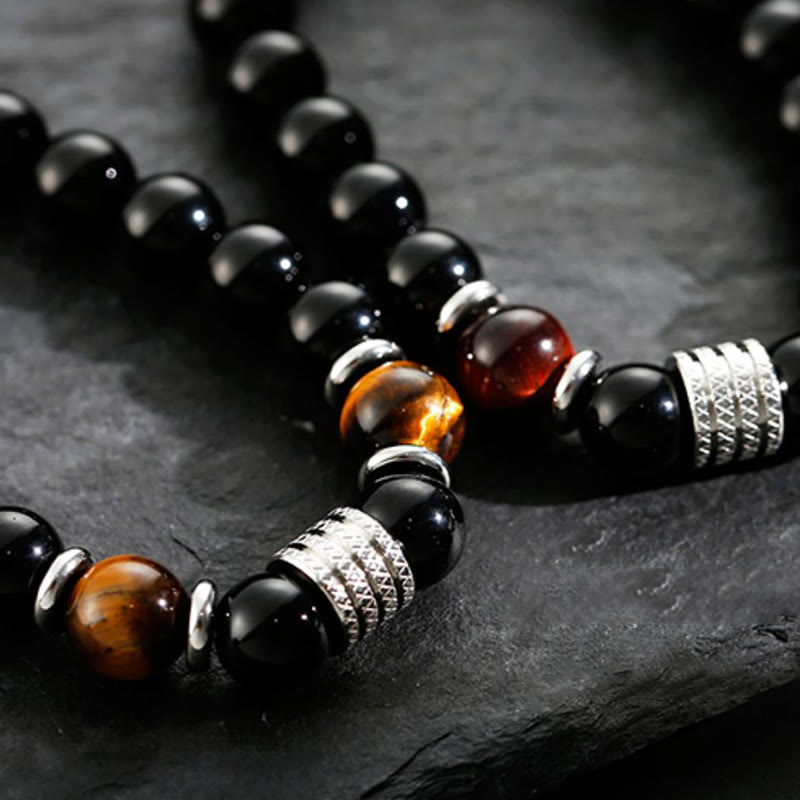Obsidianarmband 10 mm mit Tigerauge für Stärke und Gleichgewicht