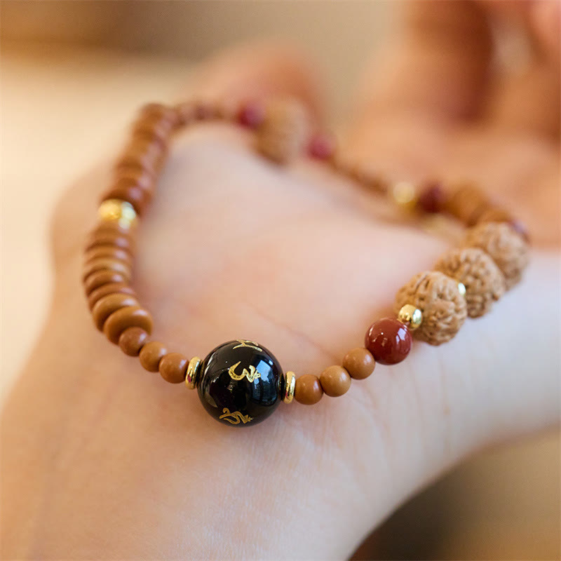 Om Mani Padme Hum Armband Bodhi Seed und schwarzer Onyx
