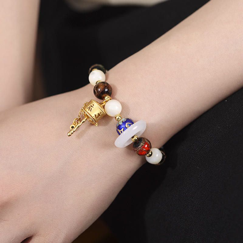 Om Mani Padme Hum Om Armband mit Tridacna &amp; Sonnensteinen 14–16 cm