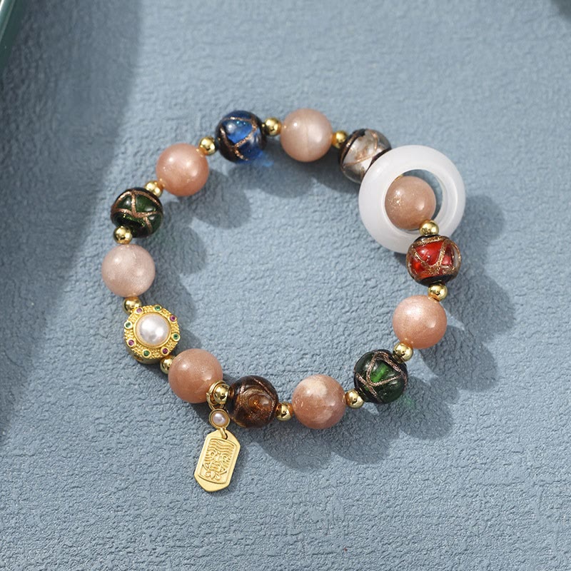 Om Mani Padme Hum Om Armband mit Tridacna &amp; Sonnensteinen 14–16 cm
