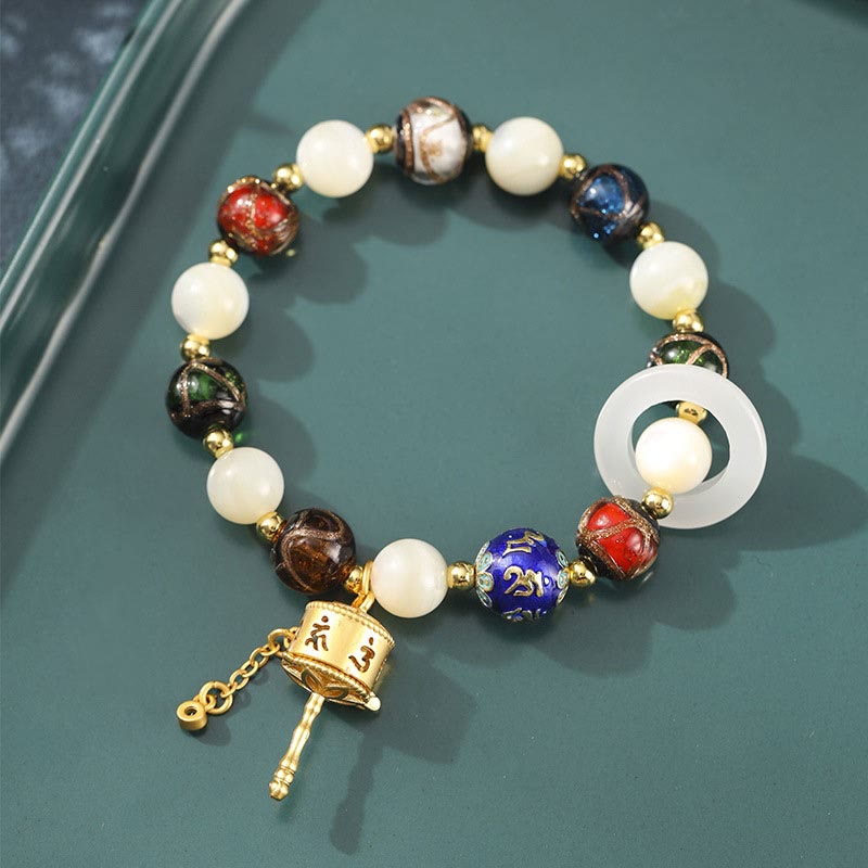 Om Mani Padme Hum Om Armband mit Tridacna &amp; Sonnensteinen 14–16 cm
