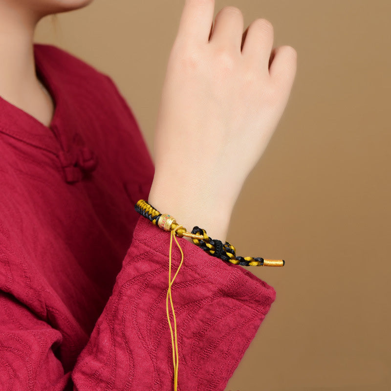 Om Mani Padme Hum Tibetisches Schwarzgold-Seilarmband