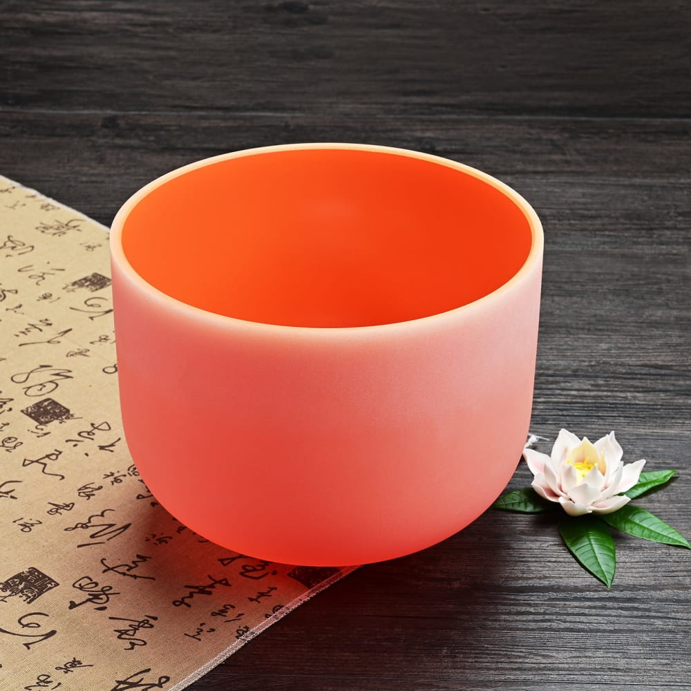 Orange ceramic singing bowl with smooth matte finish for Navel Chakra healing