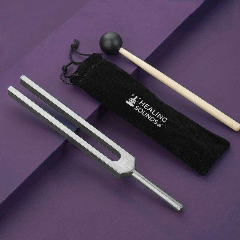 Otto C 128 Hz Tuning Fork with black storage pouch and striker ball for sound healing