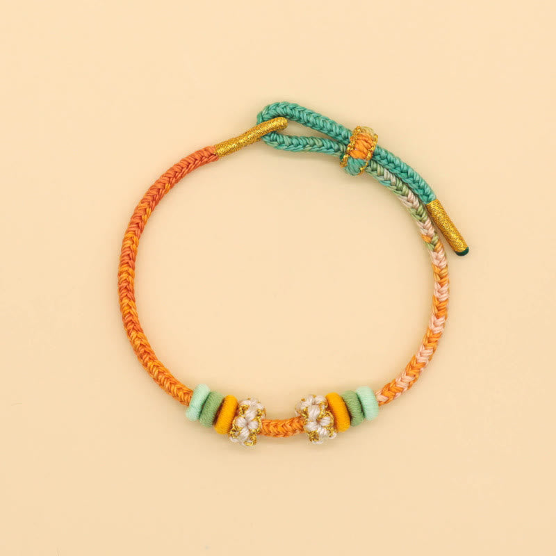 Friedensknoten-Armband mit acht roten Fäden für Glück und Harmonie