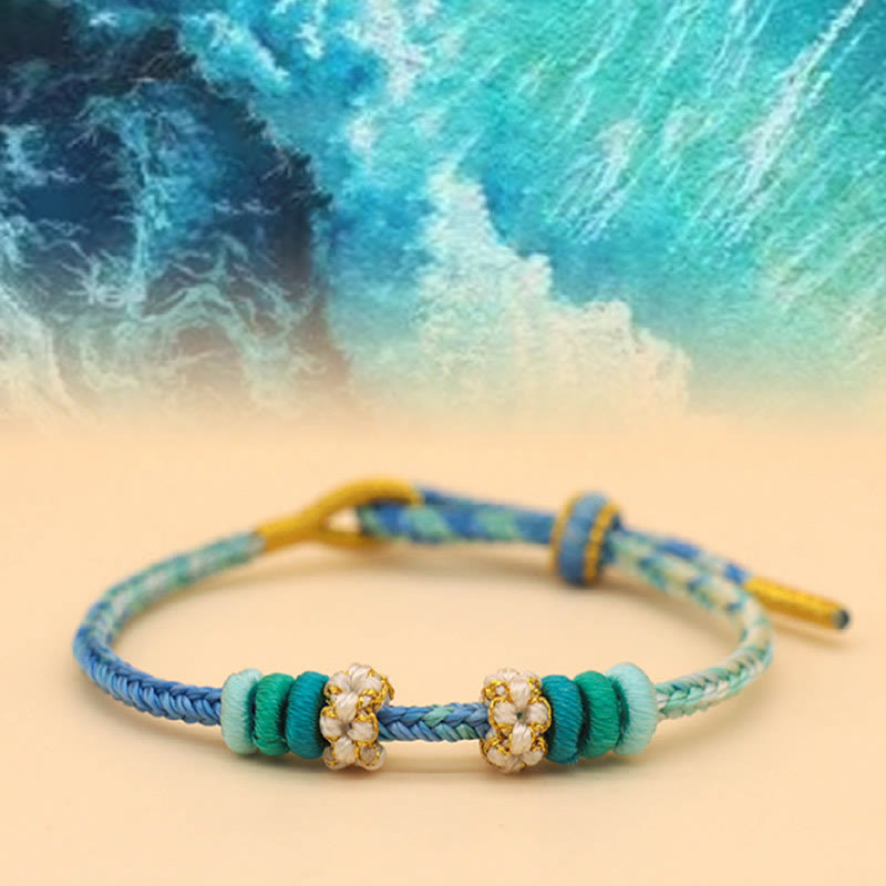 Friedensknoten-Armband mit acht roten Fäden für Glück und Harmonie