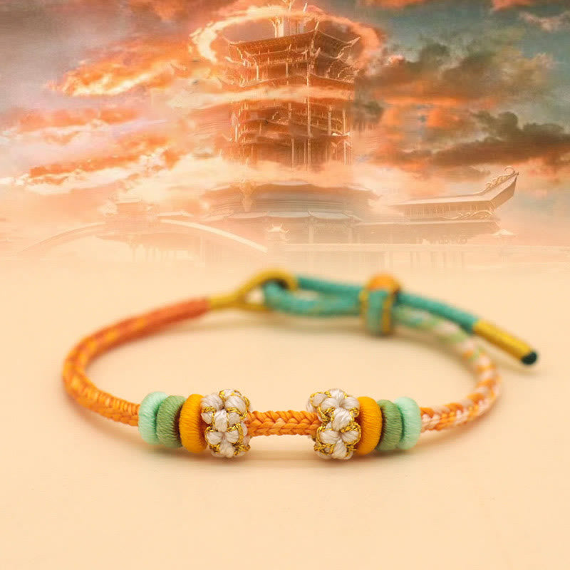 Friedensknoten-Armband mit acht roten Fäden für Glück und Harmonie
