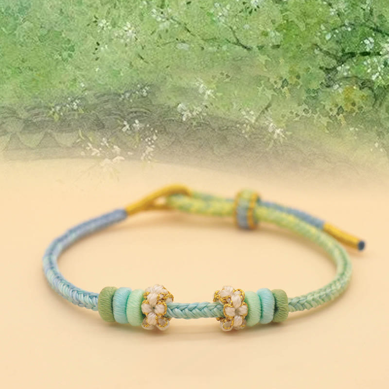 Friedensknoten-Armband mit acht roten Fäden für Glück und Harmonie