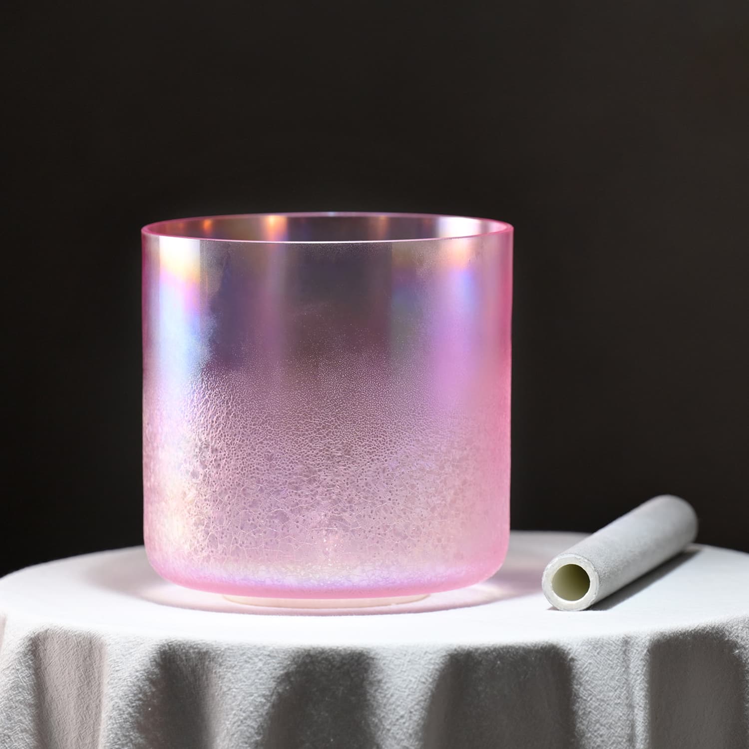 Iridescent pink glass tumbler with condensation for Pink Snow Flower Crystal Singing Bowl