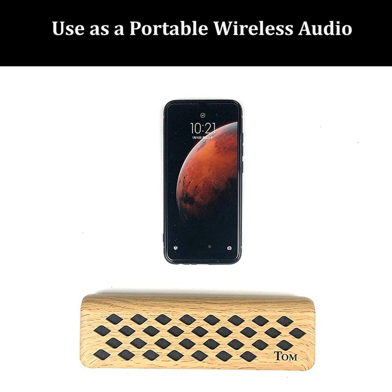 Wooden speaker amplifier with diamond cutouts and phone above, ideal for Kalimba and drum