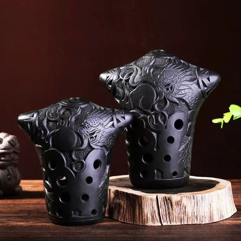 Black ceramic dragon-patterned tea cups with ventilation holes for Chinese Xun Flute