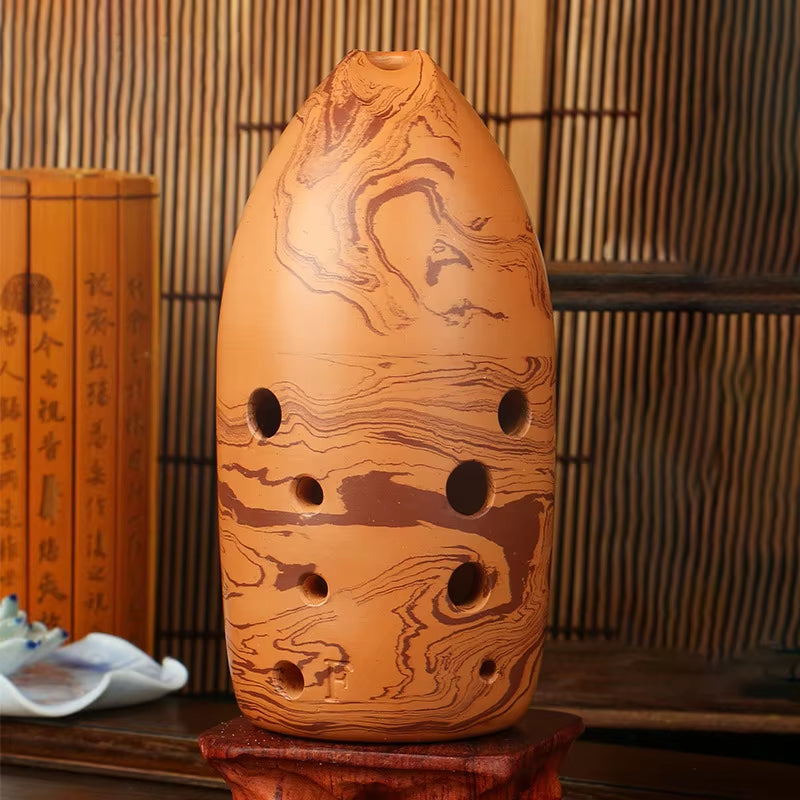 Terracotta egg-shaped lantern with wave patterns on Professional Chinese Xun Flute