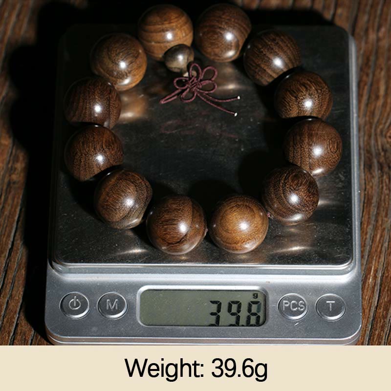 Seltenes spirituelles Armband aus Phoebe Zhennan-Holz, 15–25 mm Perlen