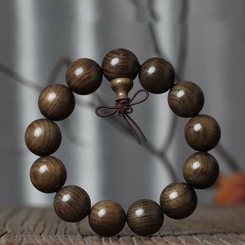 Seltenes spirituelles Armband aus Phoebe Zhennan-Holz, 15–25 mm Perlen