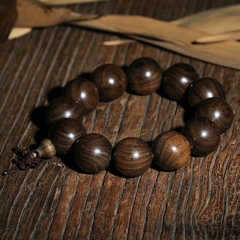 Seltenes spirituelles Armband aus Phoebe Zhennan-Holz, 15–25 mm Perlen