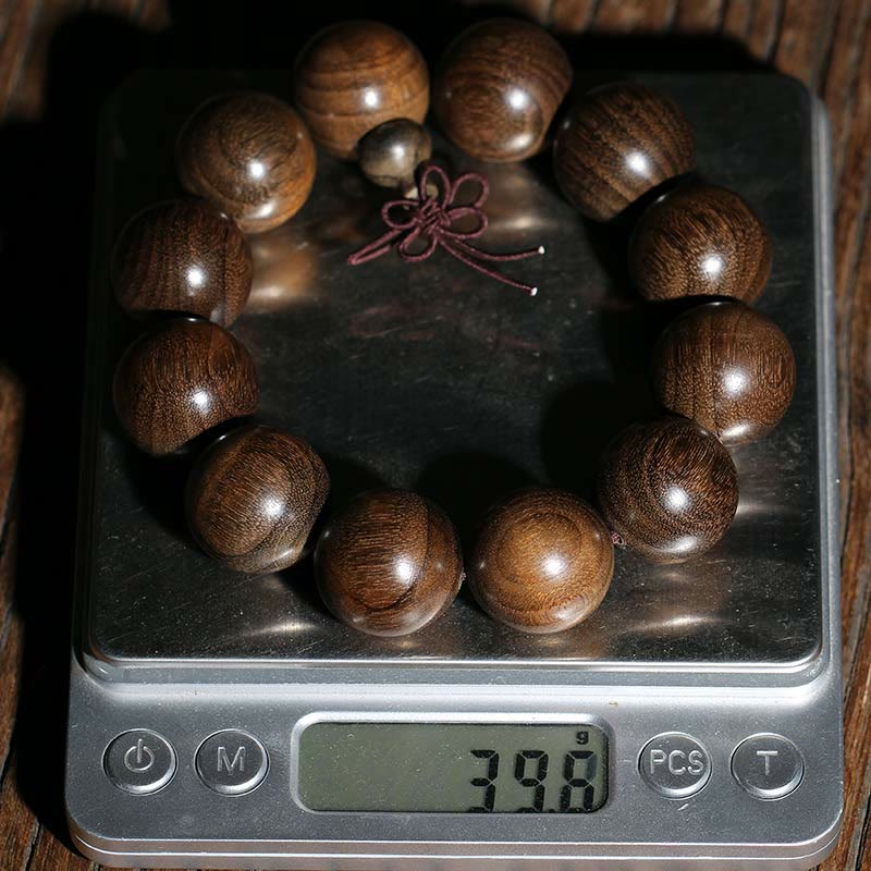 Seltenes spirituelles Armband aus Phoebe Zhennan-Holz, 15–25 mm Perlen