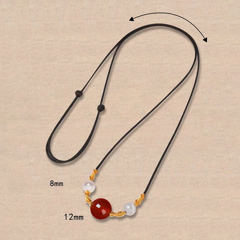Geflochtenes Armband oder Halskette mit rotem Achat-Katzenauge