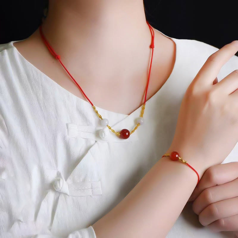 Geflochtenes Armband oder Halskette mit rotem Achat-Katzenauge