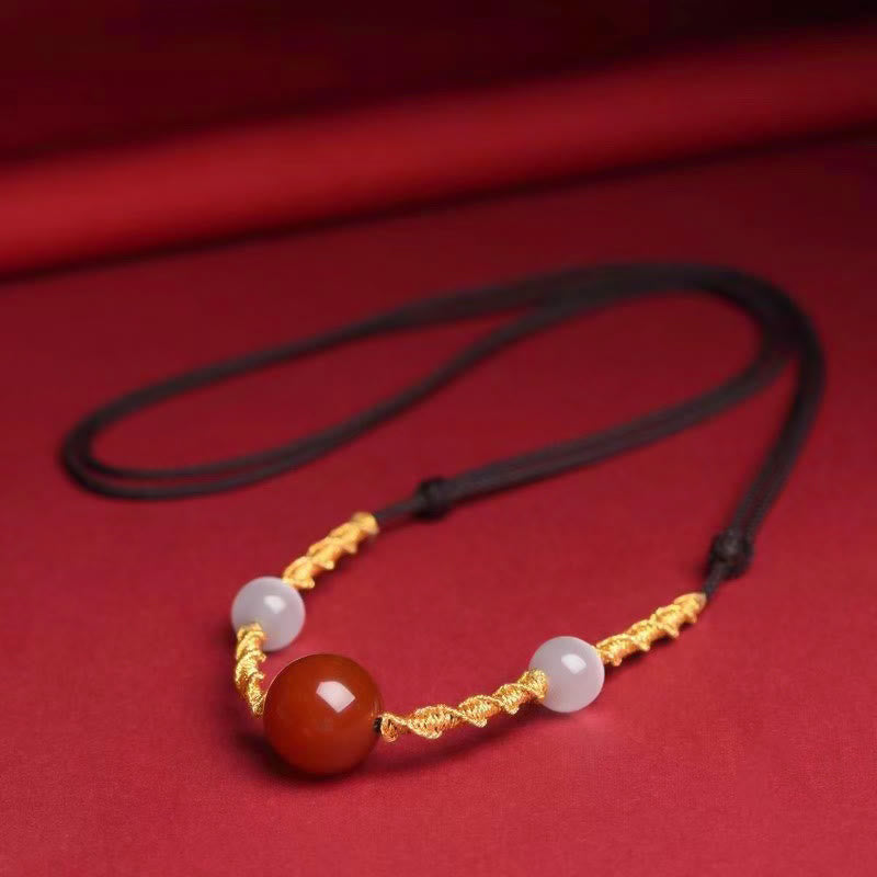 Geflochtenes Armband oder Halskette mit rotem Achat-Katzenauge