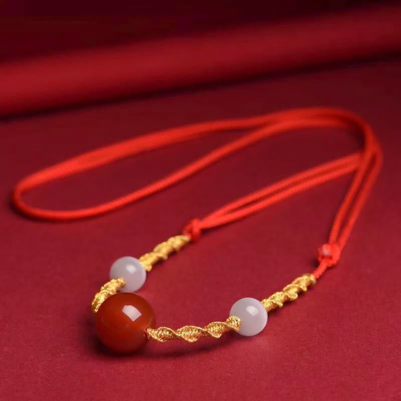 Geflochtenes Armband oder Halskette mit rotem Achat-Katzenauge