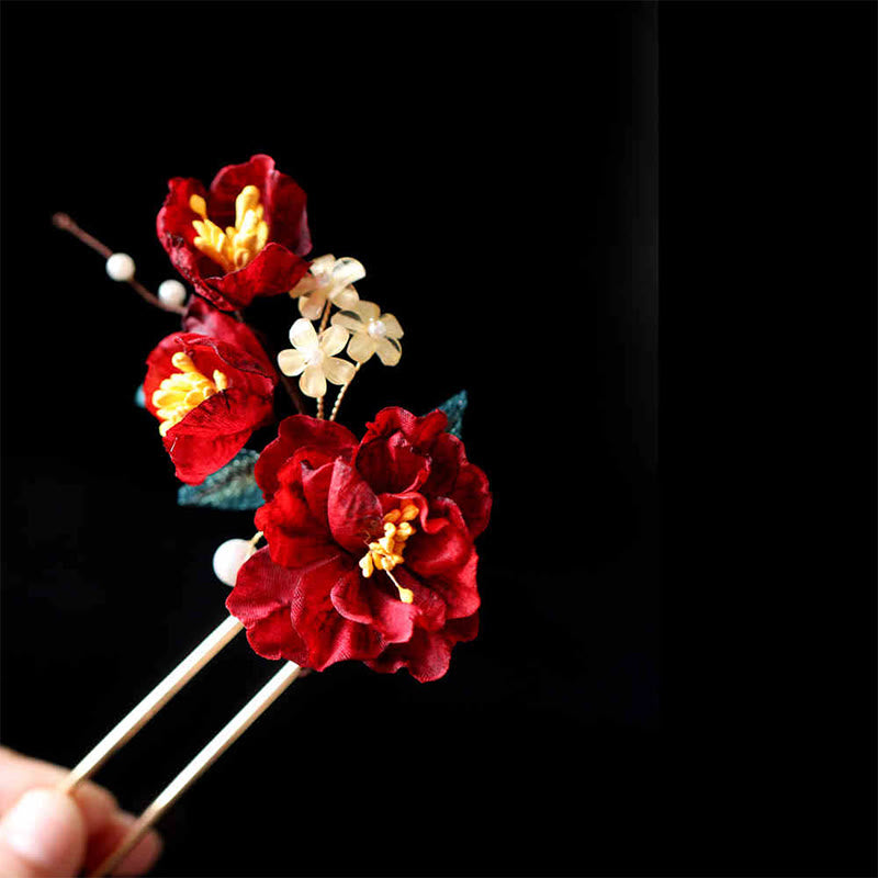 Chinesische Haarnadel mit rotem Kamelien-Schmetterling für Transformation und Hoffnung