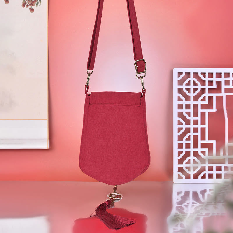 Red Magpie Lychee Stickerei Umhängetasche mit Quasten-Akzenten