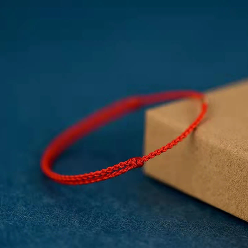 Rotes Schnurarmband mit goldenen Glücksperlen | Schutz &amp; Glück