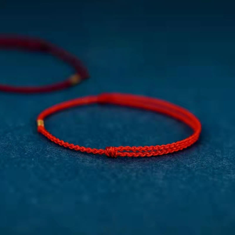Rotes Schnurarmband mit goldenen Glücksperlen | Schutz &amp; Glück