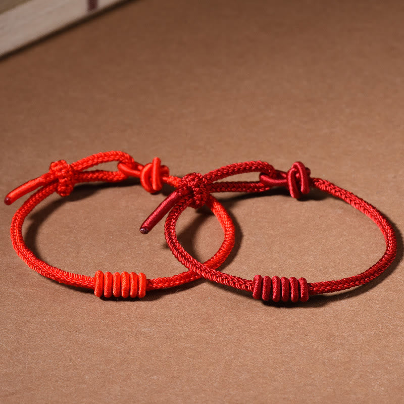 Rotes Armband mit achtsträngigem Seil