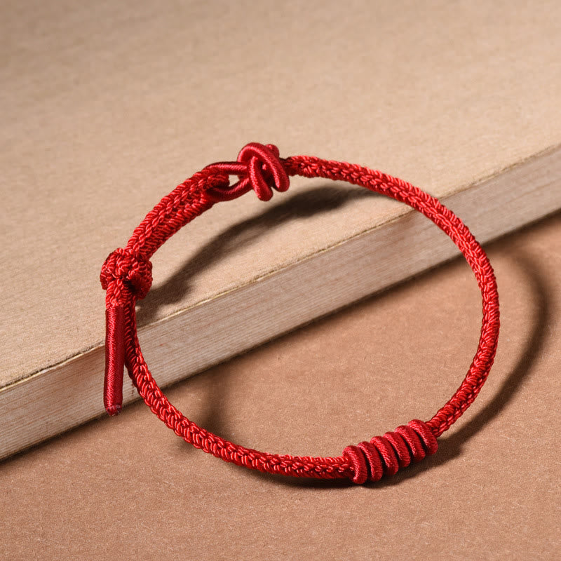 Rotes Armband mit achtsträngigem Seil