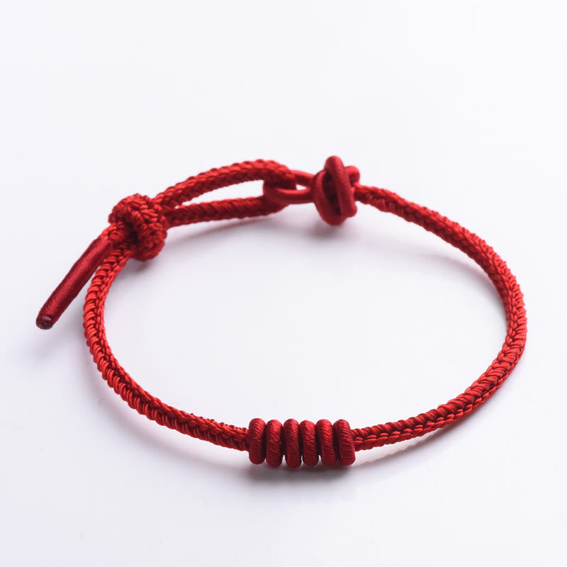 Rotes Armband mit achtsträngigem Seil