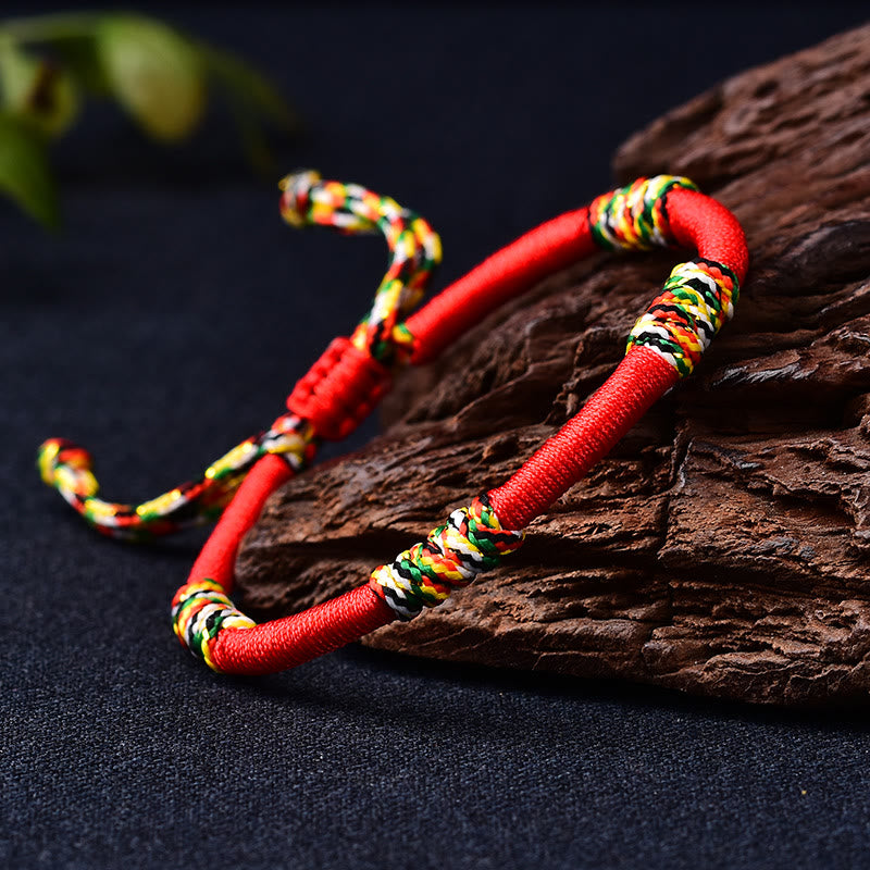 Rotes Schutzarmband mit tibetischem King Kong Knoten