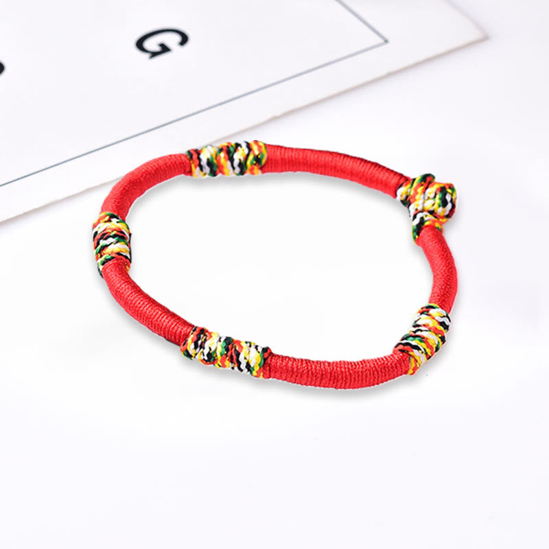 Rotes Schutzarmband mit tibetischem King Kong Knoten