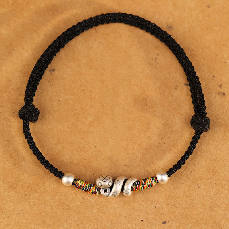 Fußkettchen mit Schlangenmotiv aus Sterlingsilber mit roter Schnur