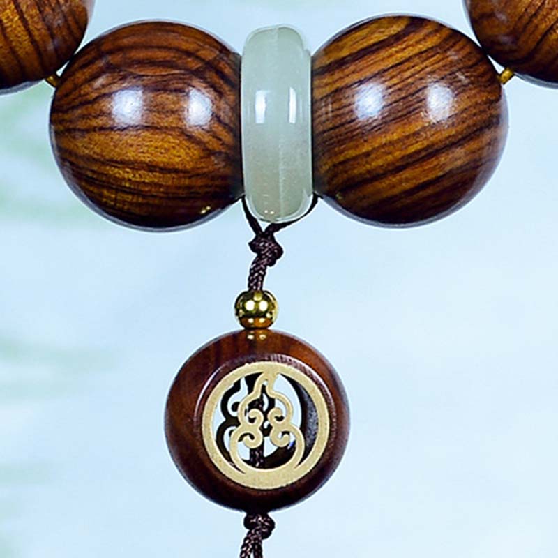 Spirituelles Armband mit Rosenholz-Kürbis-Charme für ruhigen Schutz