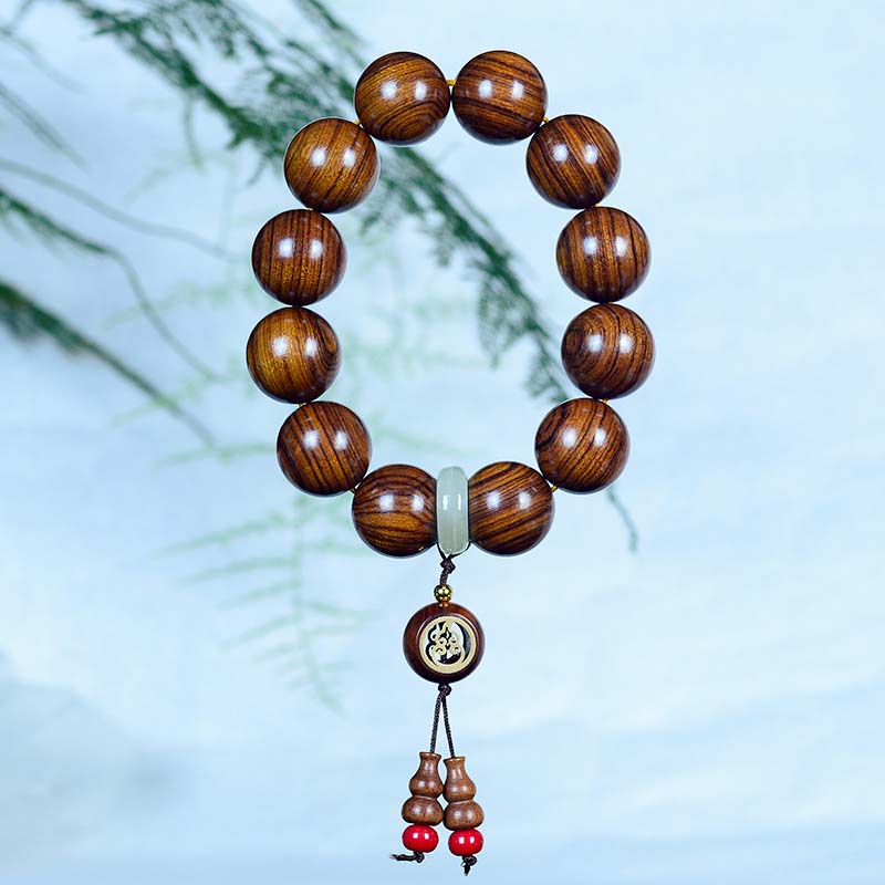 Spirituelles Armband mit Rosenholz-Kürbis-Charme für ruhigen Schutz