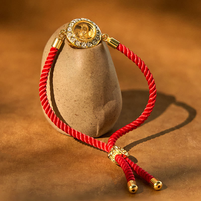 Drehbares Kupfer-Messing-Windmühlen-Armband mit roter Schnur