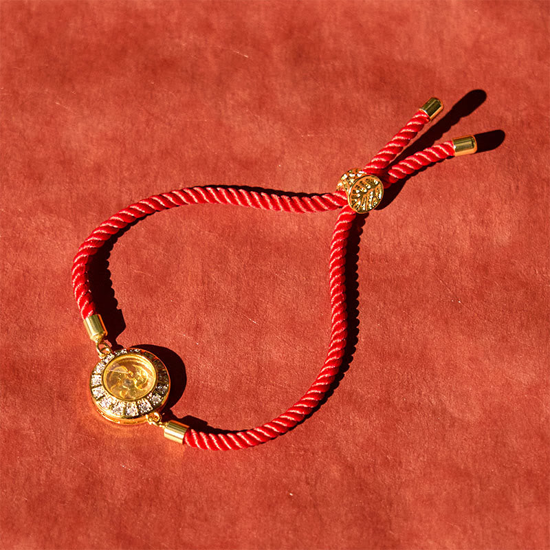 Drehbares Kupfer-Messing-Windmühlen-Armband mit roter Schnur