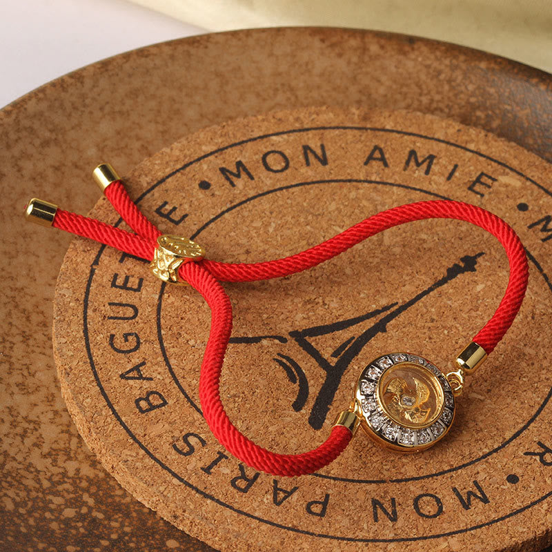 Drehbares Kupfer-Messing-Windmühlen-Armband mit roter Schnur