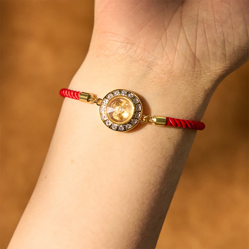 Drehbares Kupfer-Messing-Windmühlen-Armband mit roter Schnur