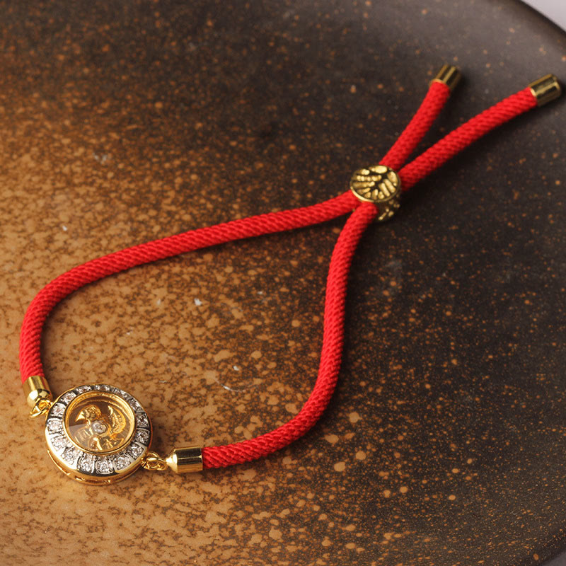 Drehbares Kupfer-Messing-Windmühlen-Armband mit roter Schnur