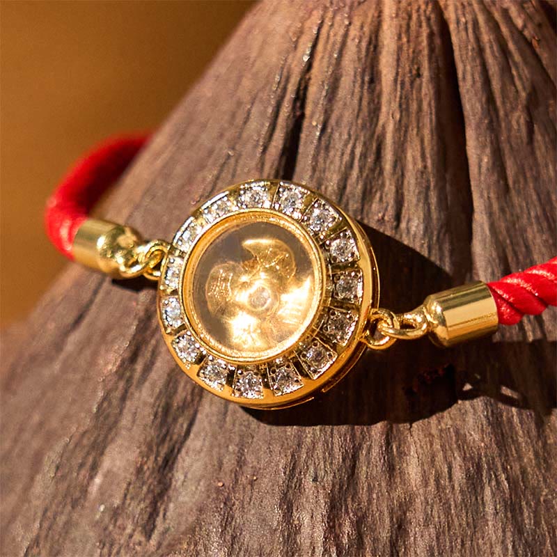 Drehbares Kupfer-Messing-Windmühlen-Armband mit roter Schnur