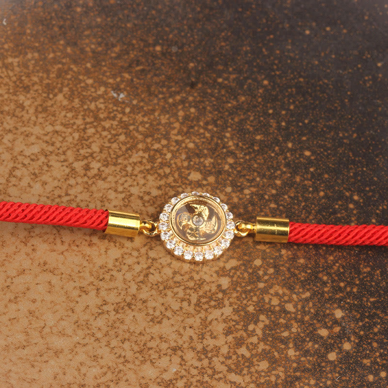 Drehbares Feng-Shui-Armband aus Kupfer mit roter Windmühlenschnur zum Schutz