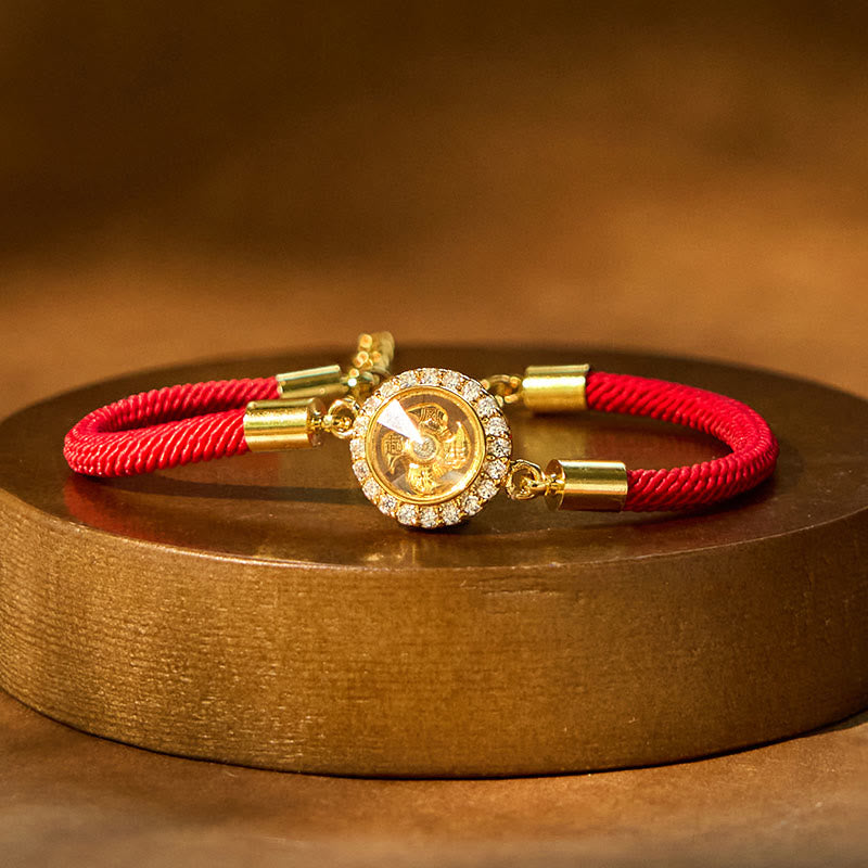 Drehbares Feng-Shui-Armband aus Kupfer mit roter Windmühlenschnur zum Schutz