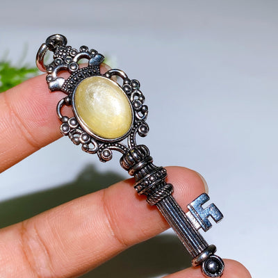 Silberner Kristall-Schlüsselanhänger mit heilenden Edelsteinen, 65 mm