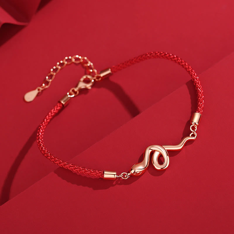 Silbernes Schlangenjahr-Armband mit roter Schnur
