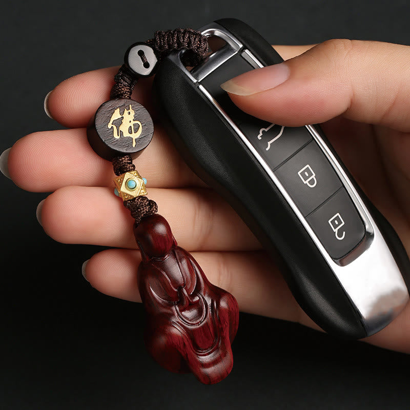 Schlüsselanhänger mit Buddha-Schutz aus rotem Sandelholz, kleinem Blatt