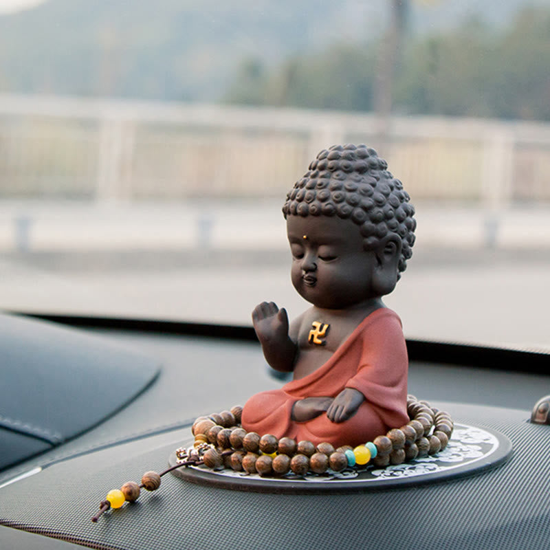 Kleine Buddha-Statue aus violettem Ton für Gelassenheit zu Hause